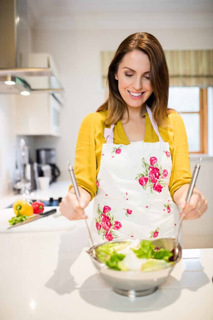 woman preparing salad kitchen 1